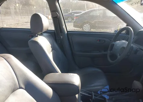 2000 Toyota Camry Le from USA, damaged, VIN JT2BG22K4Y0455775